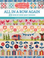 All in a row again : 23 row-by-row quilt designs