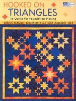 Hooked on triangles : 19 quilts for foundation piecing